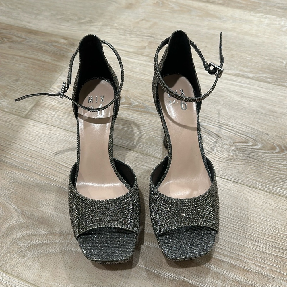 1 pair of rhinestones 4.5” high heels shows size 7 1/2 New without tag